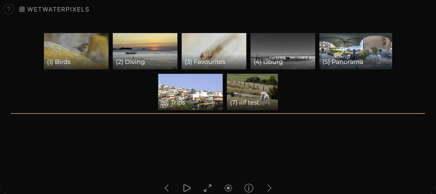 The main screen: title bar at the top, album tiles in the middle, button bar at the bottom